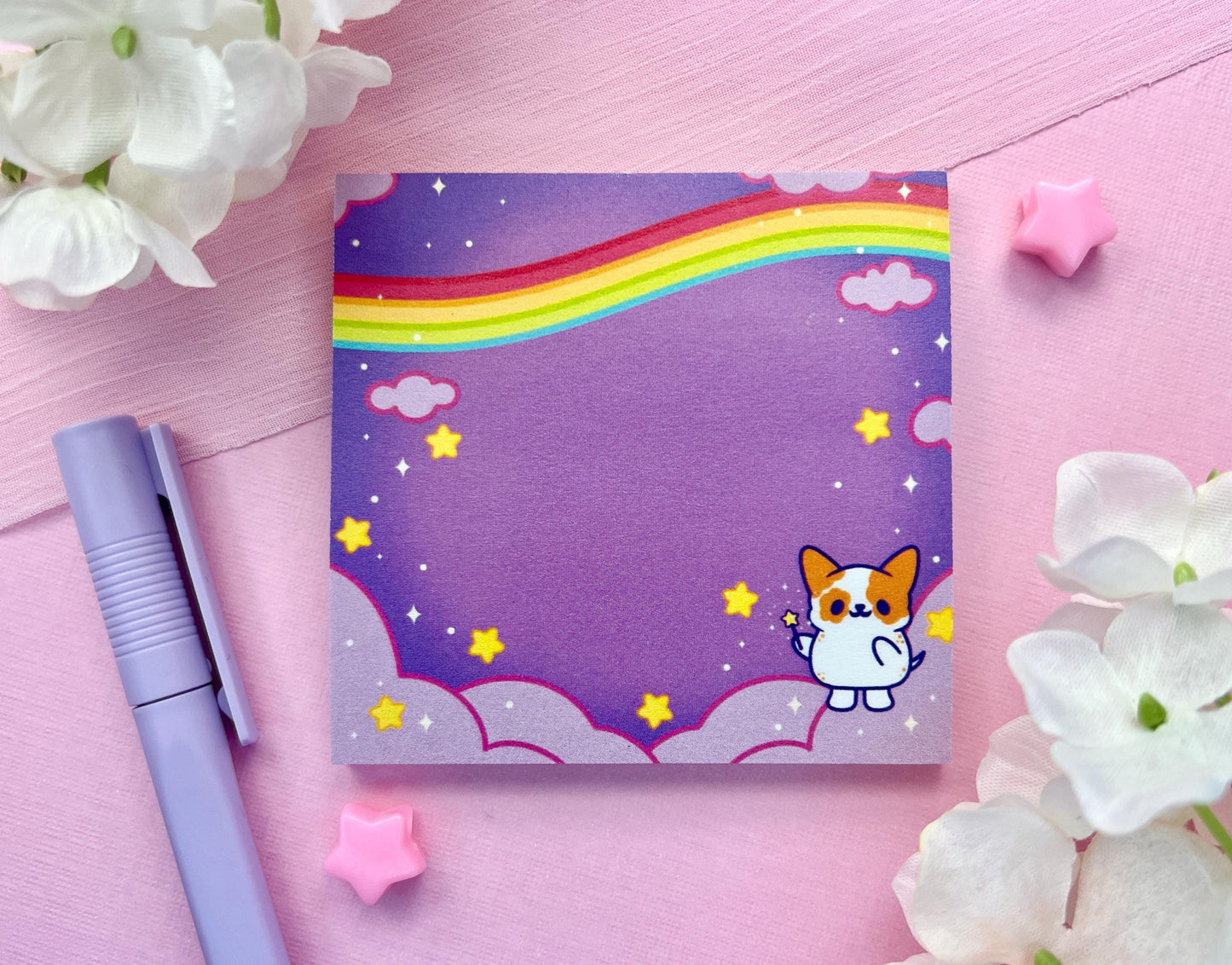 Purple sticky notes of a cute magical dog standing the the clouds below a rainbow surrounded by yellow stars holding a magical wand.