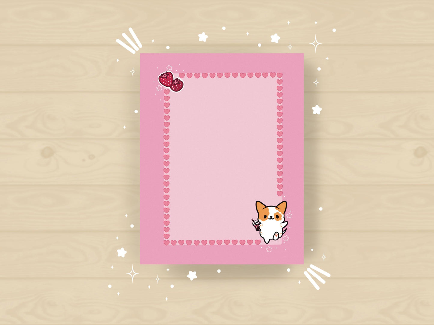 Pink notepad with an illustration of a cute dog holding boba milk tea surrounded by hearts and strawberries.