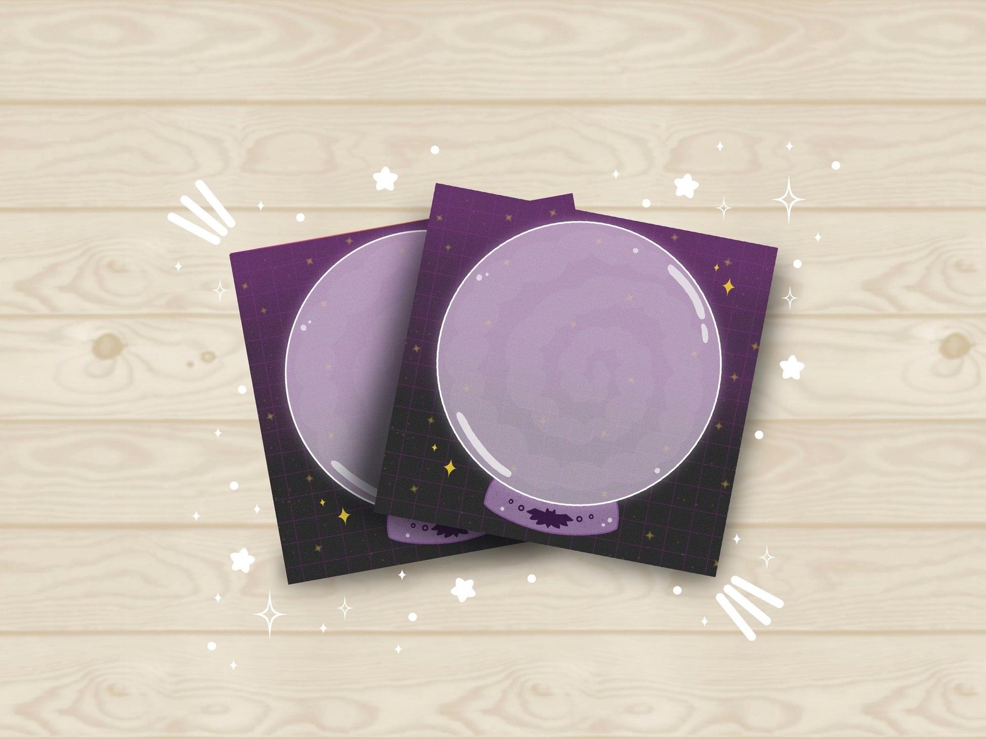 Purple and black sticky notes with a large purple crystal ball with smoke placed in the middle.