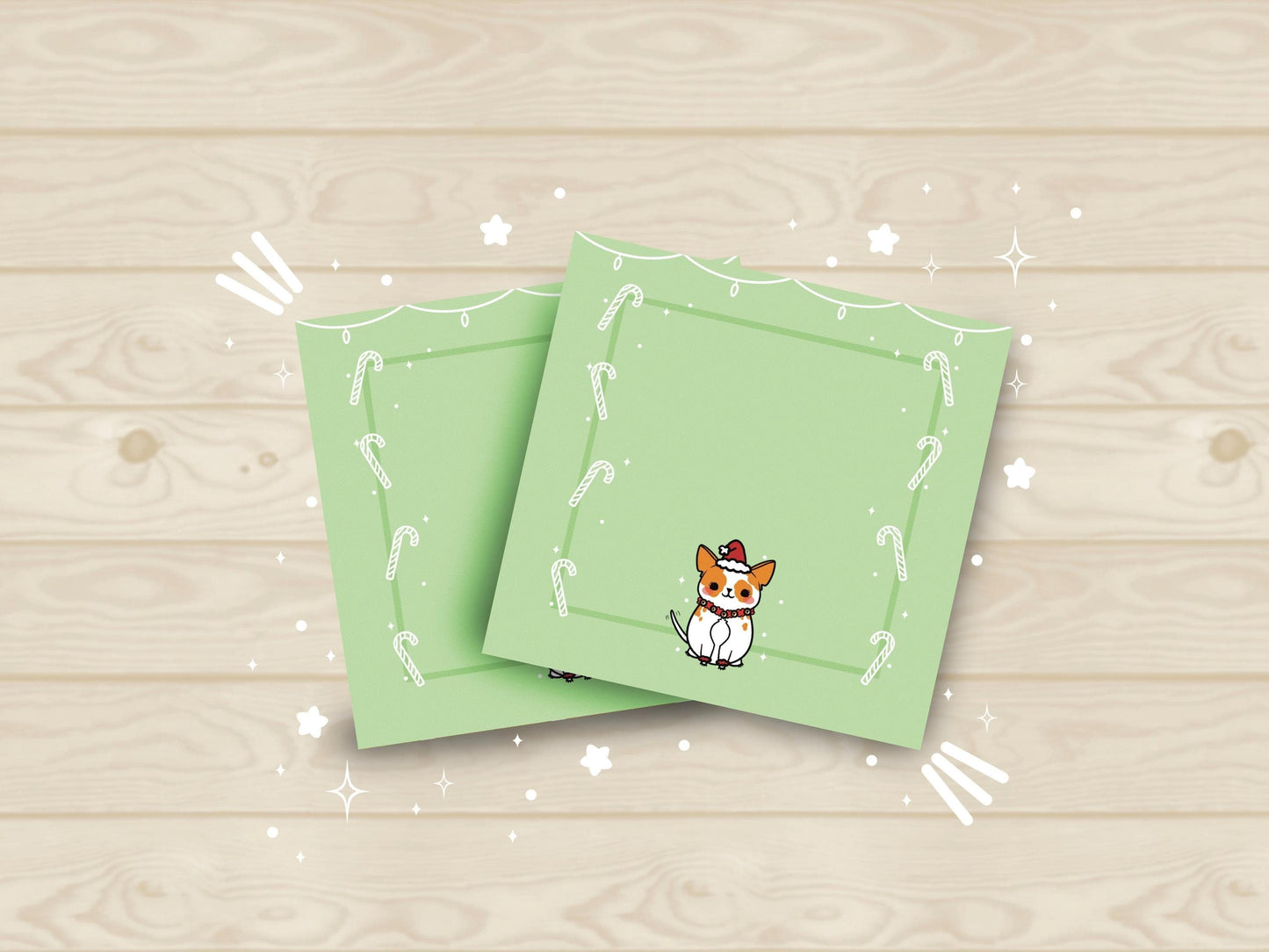 Green sticky notes with white string lights at the top, white candy canes along the sides, and a cute dog wearing a Santa Hat on the bottom.