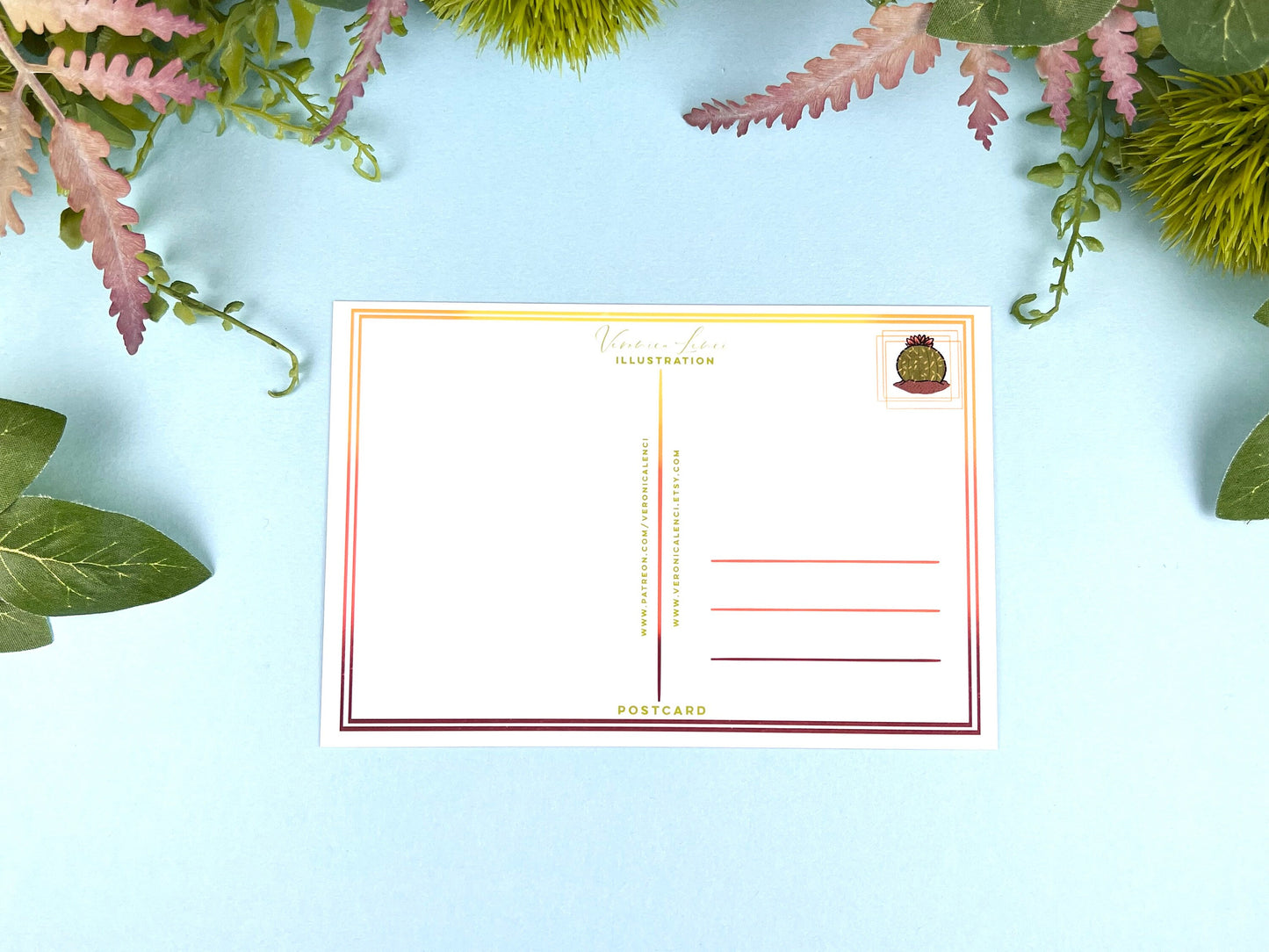 Back of the postcard with a line down the middle, lines on the right side for and address, and a cute cactus illustration where the stamp would go. 