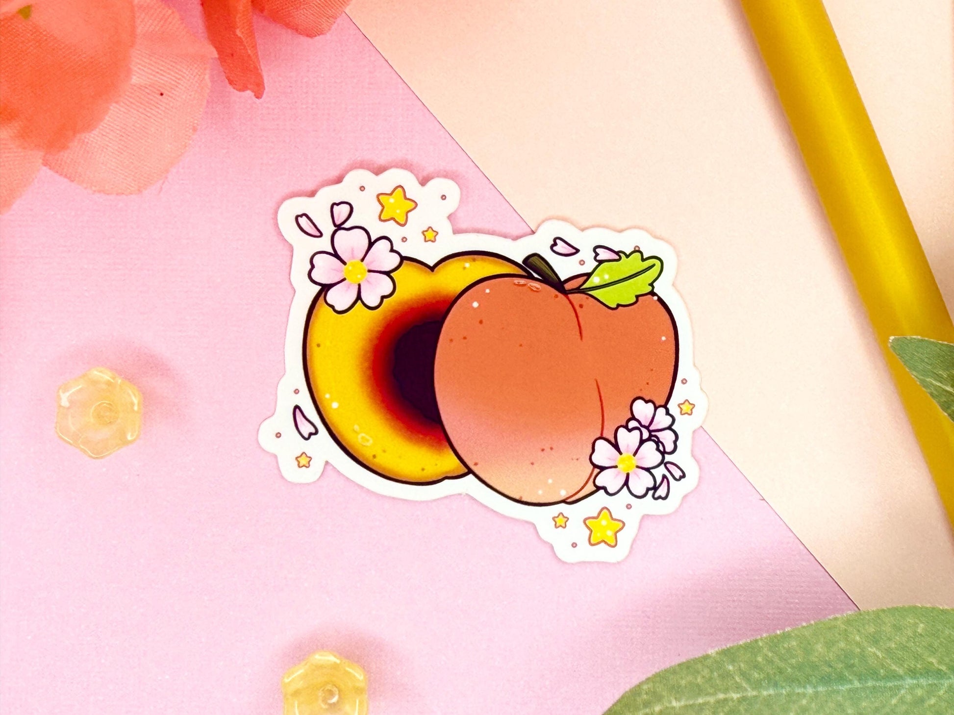 Sticker of a peach with flowers on a pink background with floral and plant elements.