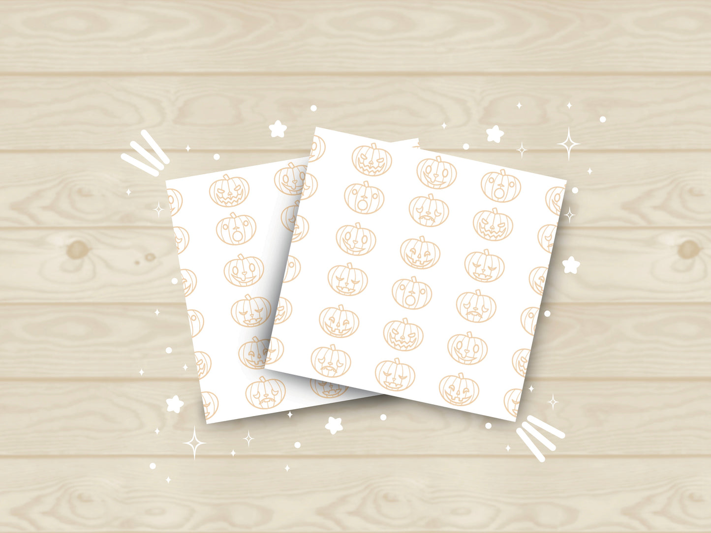 White sticky notes with orange pumpkins that have different styled faces.