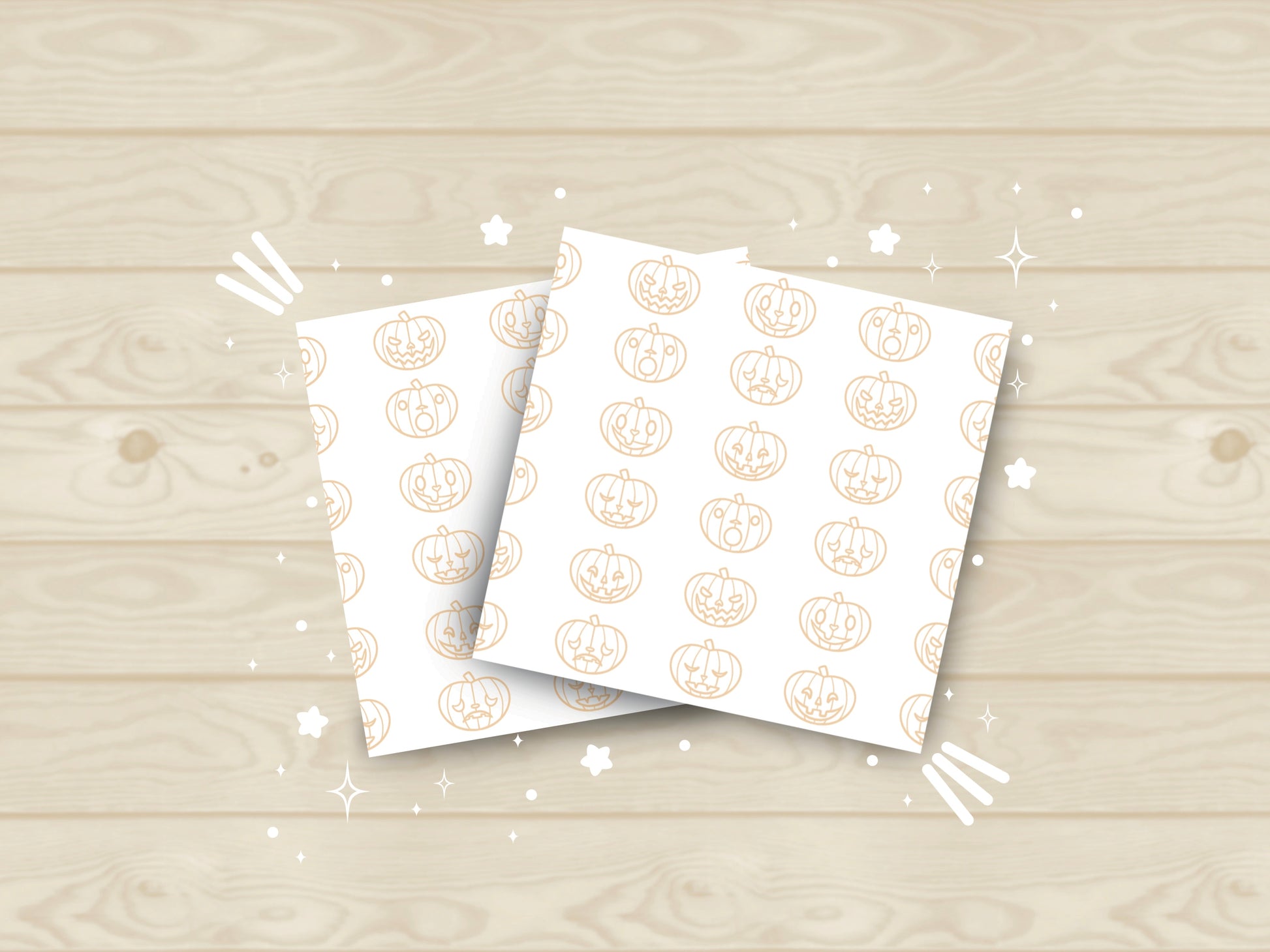 White sticky notes with orange pumpkins that have different styled faces.