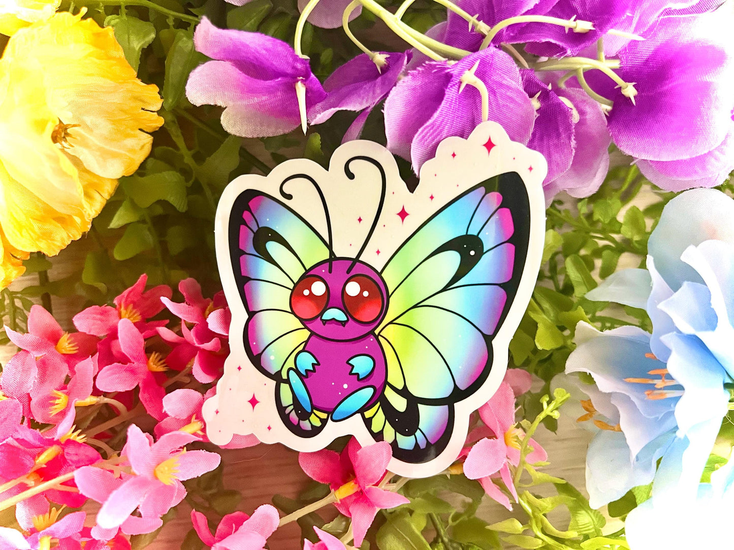 Cute colorful rainbow butterfly on a clear background sticker.