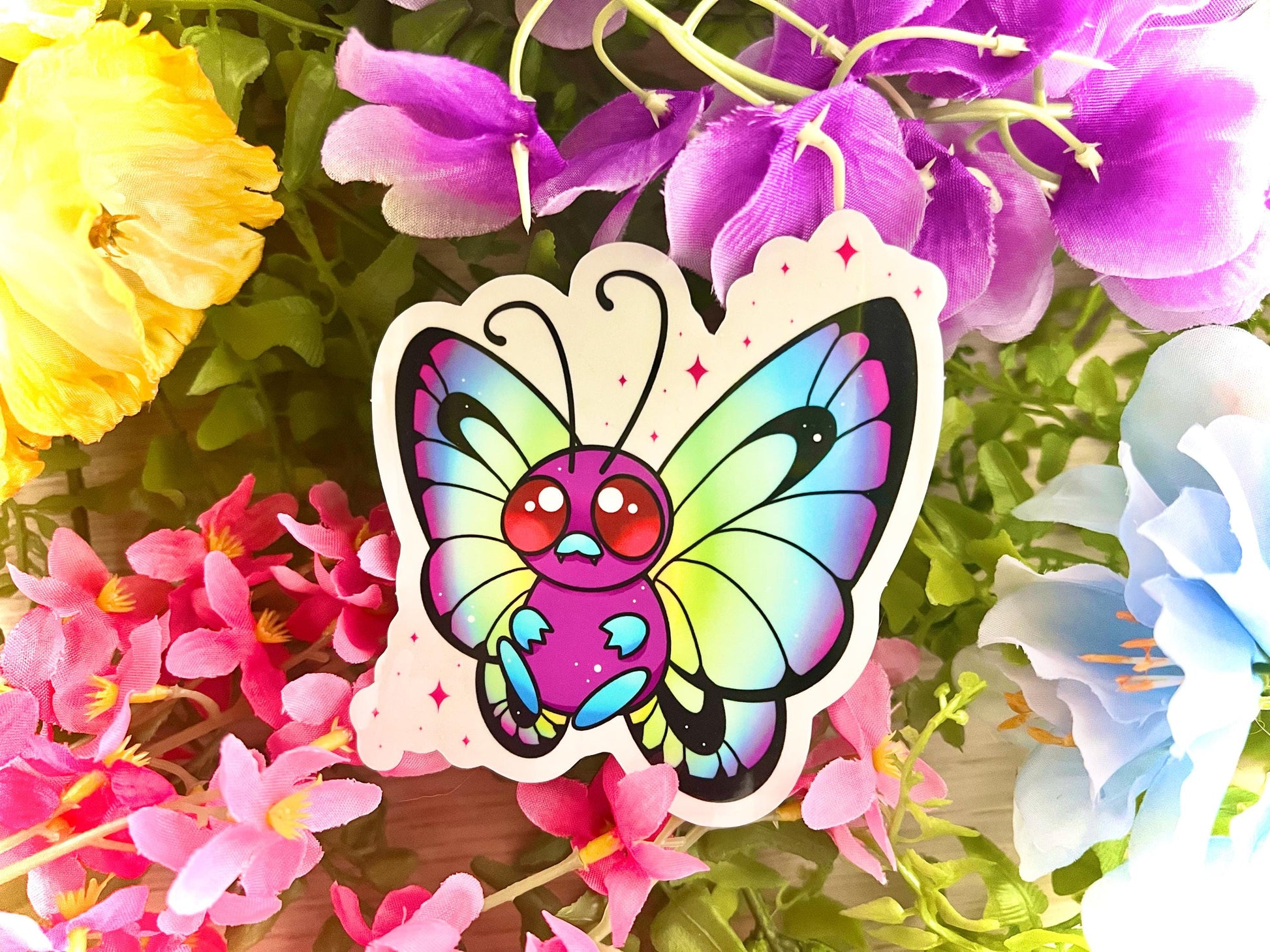 Cute colorful rainbow butterfly on a clear background sticker.