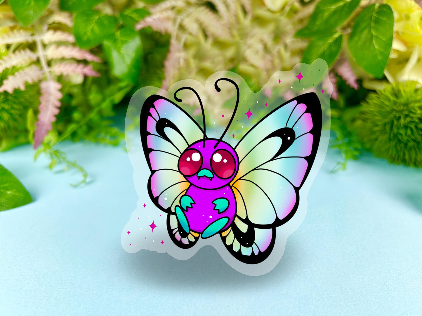 Cute colorful rainbow butterfly on a clear background sticker.