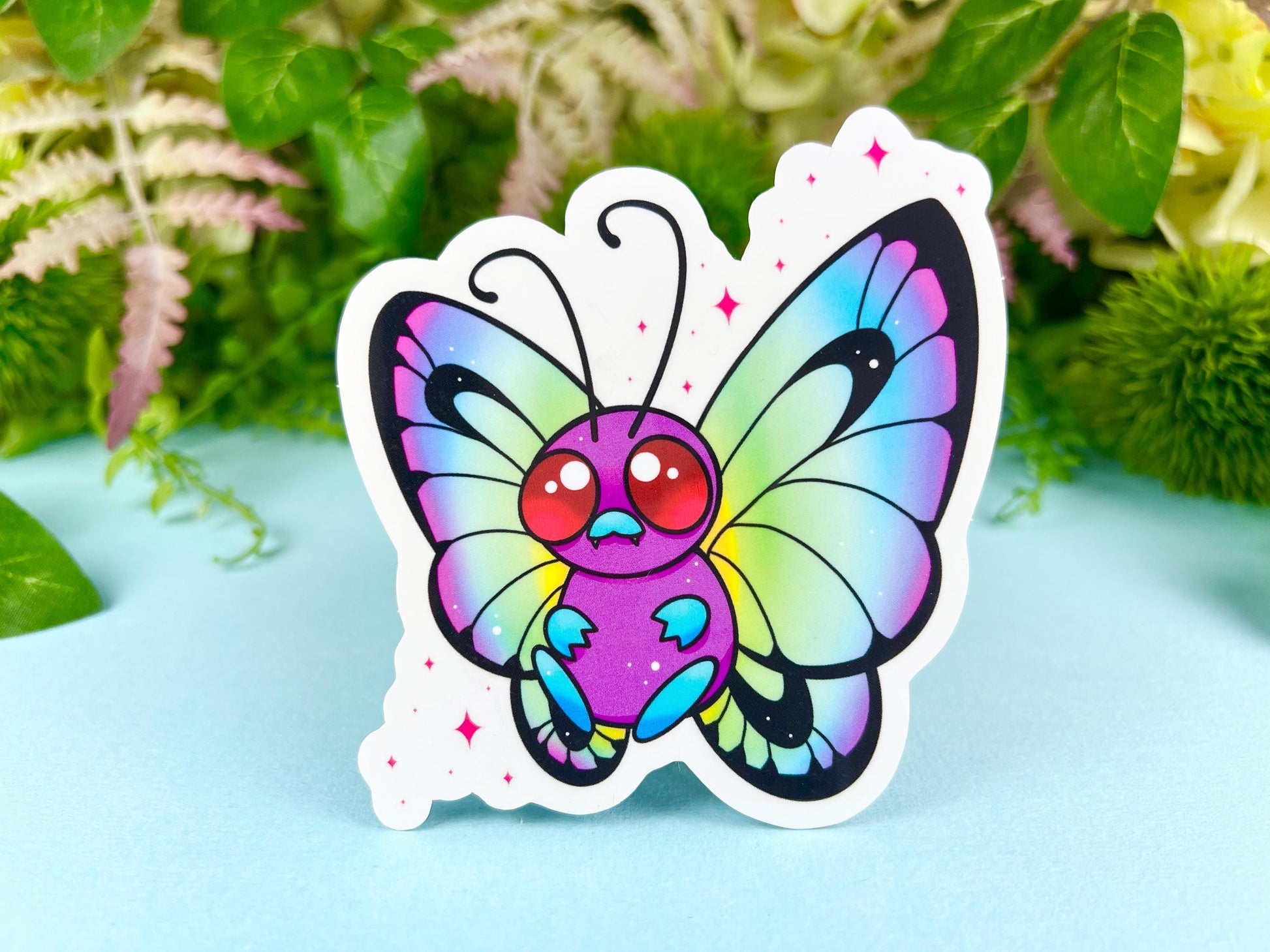 Cute colorful rainbow butterfly on a clear background sticker.