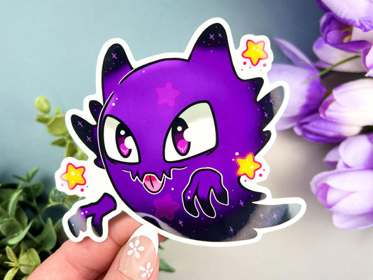 Vinyl sticker of a mischievous purple ghost with spooky grin and floating hands on waterproof vinyl
