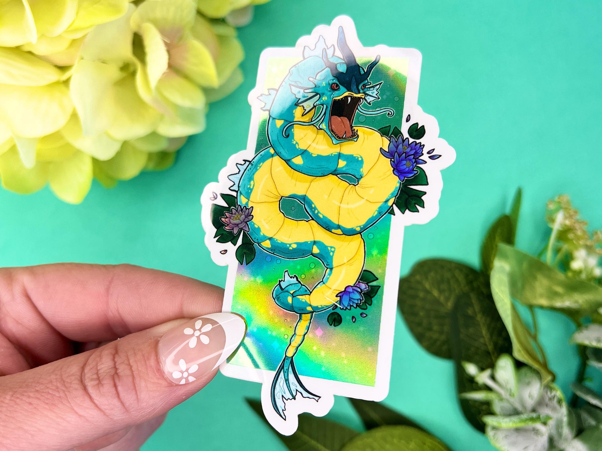 Holographic sticker of a fierce blue water dragon sea serpent with retro shiny style