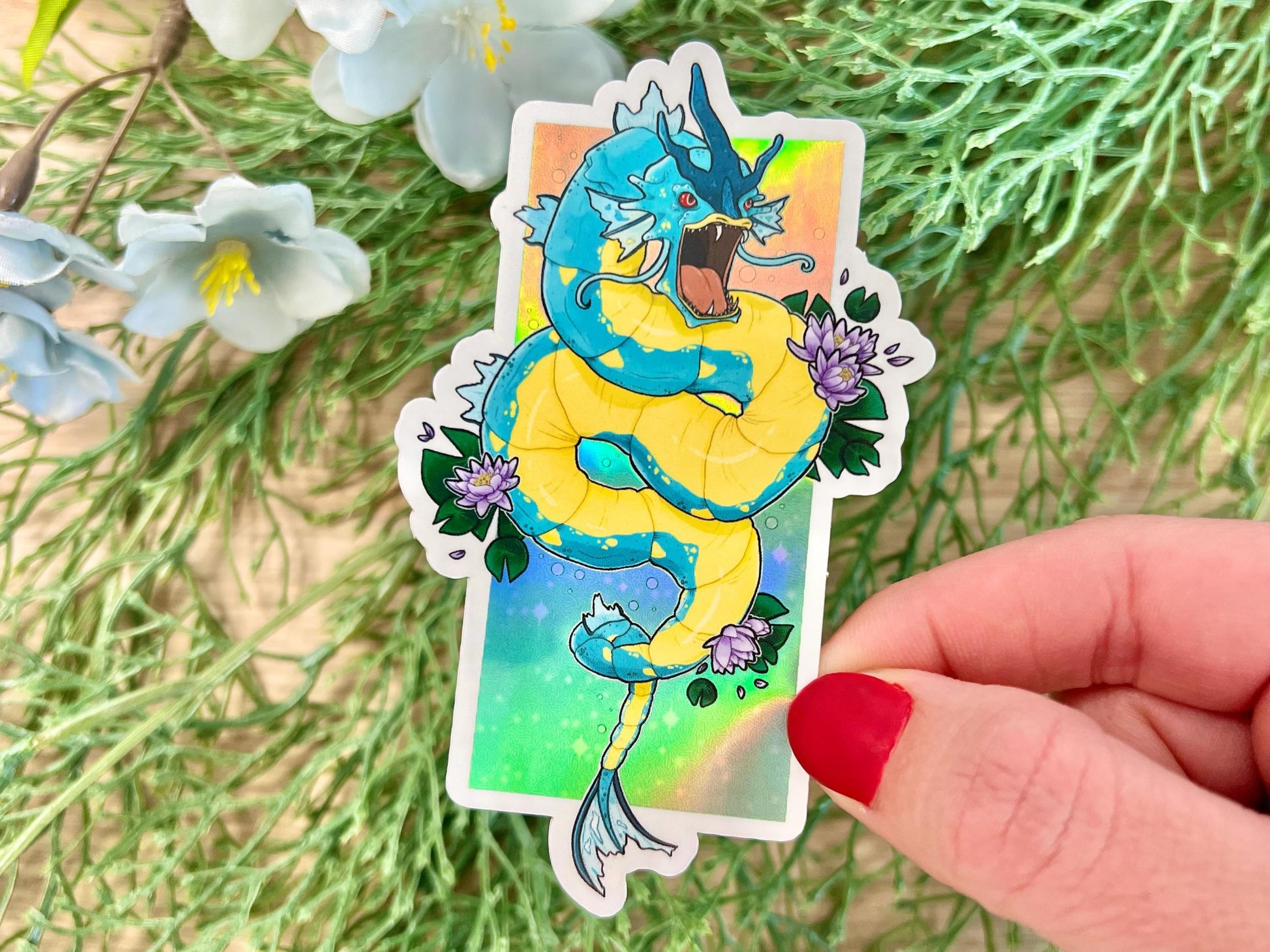 Holographic sticker of a fierce blue water dragon sea serpent with retro shiny style